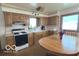 Functional kitchen with light wood cabinets and ample counter space at 2402 S Rybolt Ave, Indianapolis, IN 46241