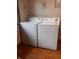 Modern white laundry machines including a dryer and washing machine at 2402 S Rybolt Ave, Indianapolis, IN 46241