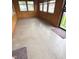 Bright and airy sunroom with multiple windows and neutral flooring at 2402 S Rybolt Ave, Indianapolis, IN 46241