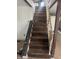 A clear view of the home's wooden staircase with decorative railing at 2425 S Lyons Ave, Indianapolis, IN 46241