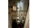 Compact bathroom featuring a pedestal sink and toilet in need of renovation and upgrades at 2517 Baur Dr, Indianapolis, IN 46220