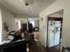 Messy interior perspective shows poor condition, cluttered furniture, and lack of upkeep at 2517 Baur Dr, Indianapolis, IN 46220