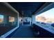 Spacious front porch with painted walls and brick accents at 2714 N Capitol Ave, Indianapolis, IN 46208