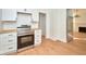 Bright kitchen featuring stainless steel appliances, white cabinets, and butcher block countertops at 2714 N Capitol Ave, Indianapolis, IN 46208