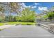 Backyard deck area with pergola, built-in seating, fire pit, and expansive lawn at 2979 Kings Ct, Carmel, IN 46032