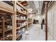 Unfinished basement for storage with wood shelving at 2979 Kings Ct, Carmel, IN 46032