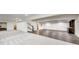 Expansive finished basement with new vinyl floors, carpet, and room for recreation and entertainment at 2979 Kings Ct, Carmel, IN 46032
