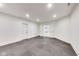 Large basement space with concrete flooring and open layout, offering potential for customization at 2979 Kings Ct, Carmel, IN 46032