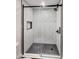 Stylish bathroom with a glass enclosed shower and elegant tiling at 2979 Kings Ct, Carmel, IN 46032