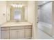Bright bathroom with a tiled shower and tub combo, complete with stylish vanity and hardware at 2979 Kings Ct, Carmel, IN 46032