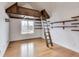 Bedroom with custom bunkbed and shelving system offers a unique and space-saving design, complemented by natural light at 2979 Kings Ct, Carmel, IN 46032