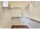 Walk-in closet featuring built-in shelving and ample storage space at 2979 Kings Ct, Carmel, IN 46032