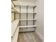 Walk-in closet featuring built-in shelving for optimal storage and organization at 2979 Kings Ct, Carmel, IN 46032