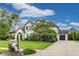 Two-story home featuring a manicured lawn, attached garage, and a charming mailbox at 2979 Kings Ct, Carmel, IN 46032