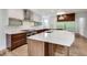 Kitchen showcases stainless steel appliances, island, and ample counter space at 2979 Kings Ct, Carmel, IN 46032