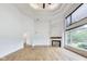 Living room has a fireplace and vaulted ceilings at 2979 Kings Ct, Carmel, IN 46032