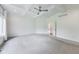 Main bedroom with coffered ceilings and a view to the outside at 2979 Kings Ct, Carmel, IN 46032