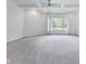 Main bedroom with carpet, white trim, and bright light at 2979 Kings Ct, Carmel, IN 46032