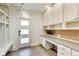 Well-organized mud room with built-in cabinets, desk area, and plenty of storage at 2979 Kings Ct, Carmel, IN 46032