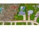Aerial view showing home with pool and approximate property lines at 310 Edgewood E Pl, Anderson, IN 46011