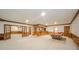 Spacious finished basement with pool table and wet bar, perfect for entertaining at 310 Edgewood E Pl, Anderson, IN 46011