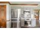 Modern kitchen with stainless steel appliances and gray cabinetry at 310 Edgewood E Pl, Anderson, IN 46011
