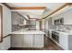 Modern gray kitchen with stainless steel appliances and white countertops at 310 Edgewood E Pl, Anderson, IN 46011