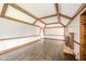 Living room with wood beams, fireplace, and hardwood floors at 310 Edgewood E Pl, Anderson, IN 46011