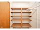 Pantry with wood shelving offers additional storage at 310 Edgewood E Pl, Anderson, IN 46011