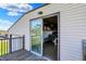 Balcony with sliding glass door leading to a well-lit interior space at 3104 Poplar St, Anderson, IN 46012