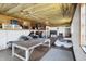 Finished basement with suspended ceiling, sofa, table tennis, and recreation area at 3104 Poplar St, Anderson, IN 46012