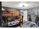 bedroom features a bunk bed, shelves, and soft rug at 3104 Poplar St, Anderson, IN 46012