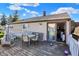 Wooden deck with furniture offering outdoor dining and relaxing at 3104 Poplar St, Anderson, IN 46012
