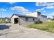 Spacious property featuring a detached garage and ample parking space at 3104 Poplar St, Anderson, IN 46012