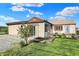 Charming single-story home with a well-maintained lawn and inviting front facade at 3104 Poplar St, Anderson, IN 46012