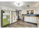 Charming kitchen with white cabinets, wood countertops, and updated appliances at 3104 Poplar St, Anderson, IN 46012