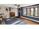 Inviting living room featuring hardwood floors, a bay window, and traditional decor at 3104 Poplar St, Anderson, IN 46012
