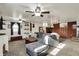 Comfortable living room with brick fireplace, carpet, and windows at 3104 Poplar St, Anderson, IN 46012