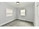Inviting bedroom with natural light streaming through the window and neutral carpet flooring at 3109 Forest Manor Ave, Indianapolis, IN 46218