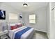 Stylishly staged main bedroom featuring a comfortable bed and coordinated decor at 3109 Forest Manor Ave, Indianapolis, IN 46218