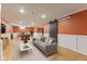 Finished basement featuring a couch and pool table area at 3421 Arthington Blvd, Indianapolis, IN 46218