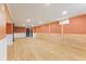 Spacious basement with vinyl flooring and wood paneling at 3421 Arthington Blvd, Indianapolis, IN 46218