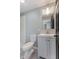 Bathroom featuring white subway tile shower and white vanity at 3421 Arthington Blvd, Indianapolis, IN 46218