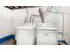 Unfinished basement laundry area with a washer and dryer hookup at 4406 Carrollton Ave, Indianapolis, IN 46205