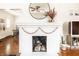 Cozy living room featuring a decorative fireplace and modern furnishings at 4406 Carrollton Ave, Indianapolis, IN 46205