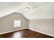 Charming attic space with dormer window and wood flooring at 4623 Evanston Ave, Indianapolis, IN 46205