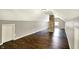 Spacious attic featuring exposed brick, wood floors and neutral-colored walls at 4623 Evanston Ave, Indianapolis, IN 46205