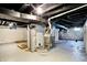 Unfinished basement with visible pipes, equipment and concrete floor at 4623 Evanston Ave, Indianapolis, IN 46205