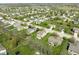 An aerial view shows a vibrant neighborhood with well-maintained lawns and tree-lined streets at 4625 Elkhorn Ct, Noblesville, IN 46062