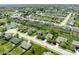 An aerial perspective reveals a charming neighborhood with picturesque ponds and tree-lined streets at 4625 Elkhorn Ct, Noblesville, IN 46062